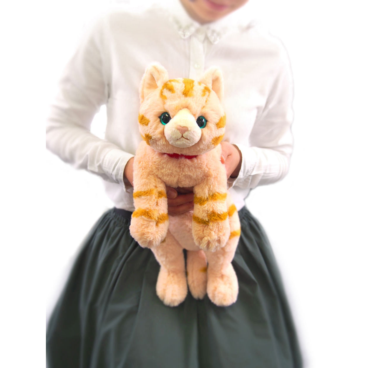 LYING CAT STUFFED TOY M BROWN TABBY